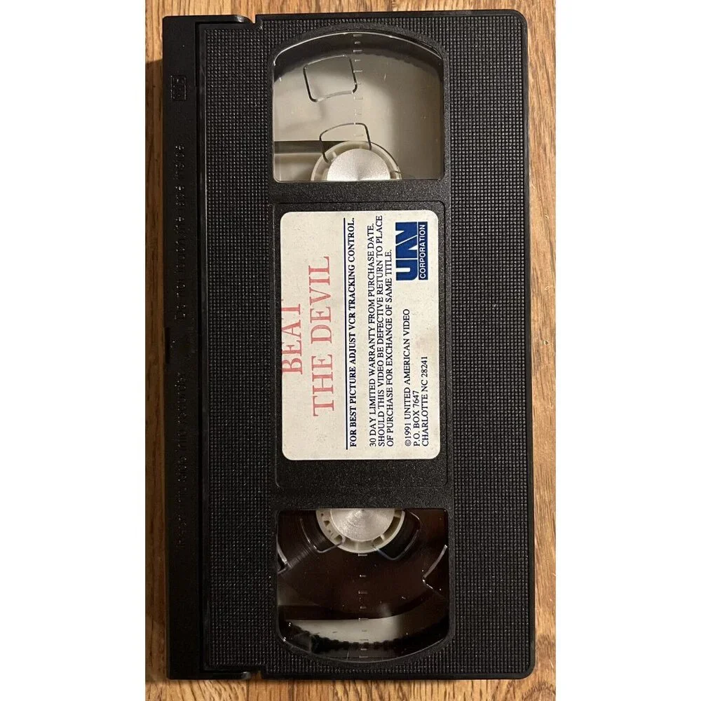 Beat the Devil (VHS 1985) Humphrey Bogart, Gina Lollobrigida, Peter Lorre